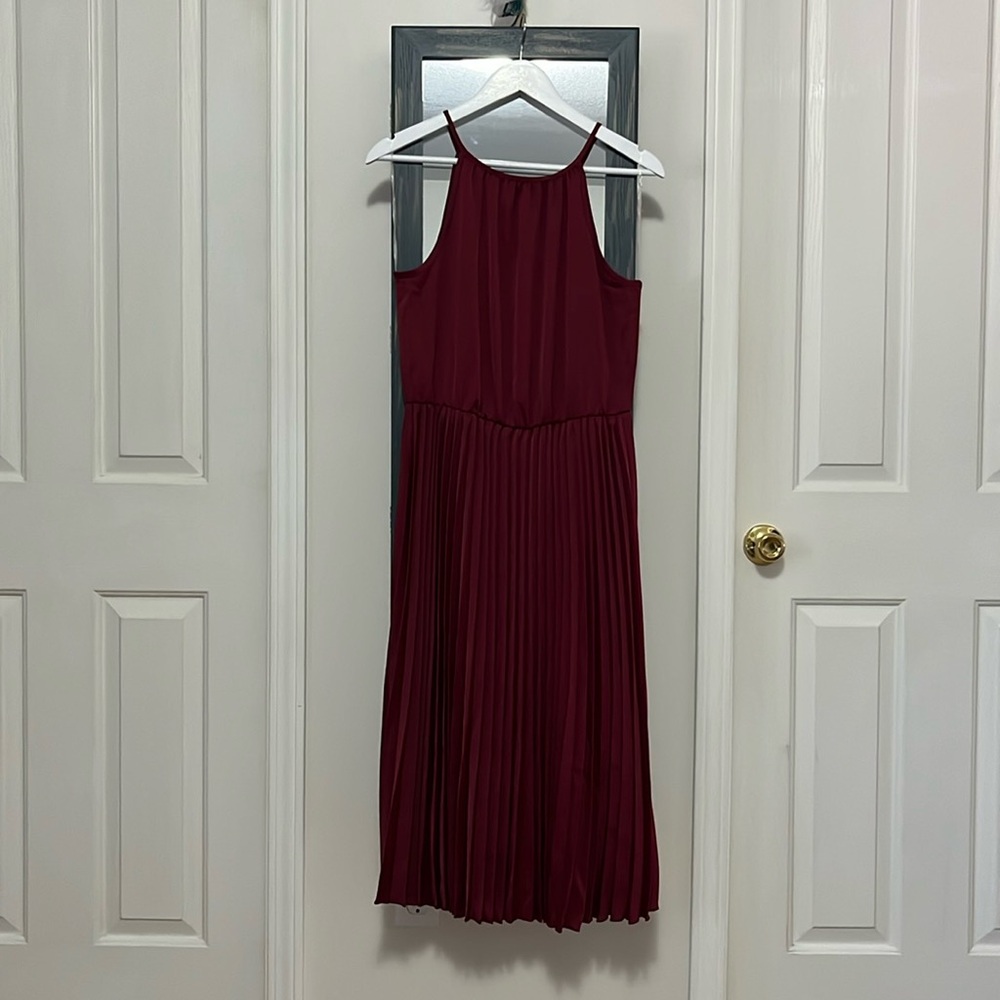 Francesca’s size large tea-length dress in burgundy.